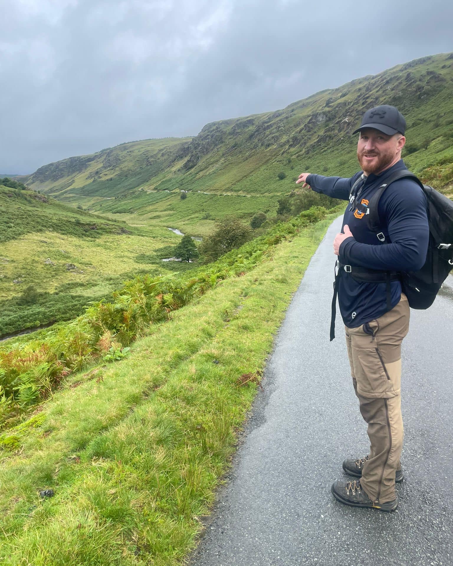Phil Stone standing in the hills