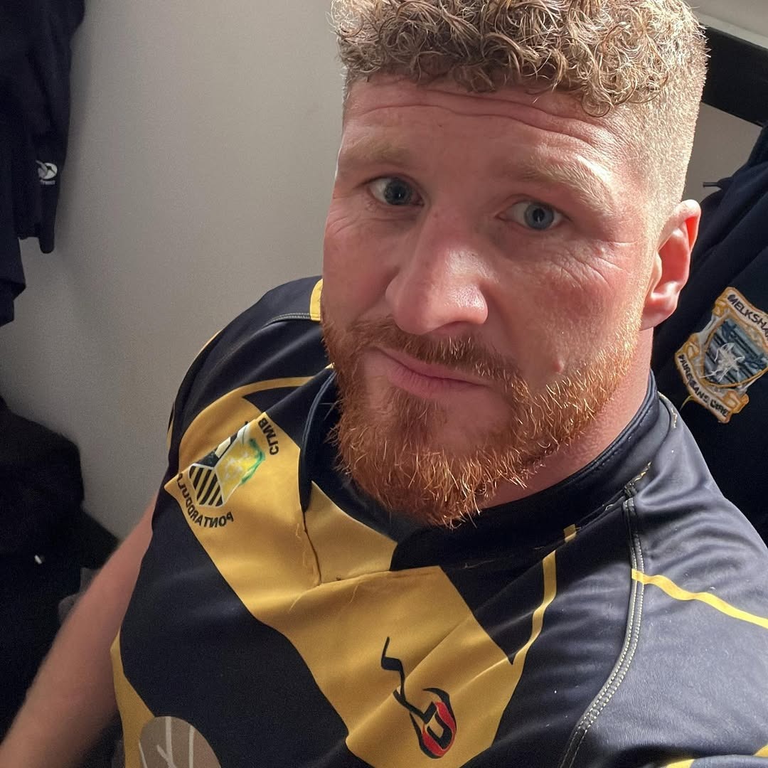 Phil Stone in a black and yellow top